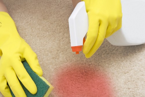 Professional move out cleaning in a Knightsbridge apartment with detailed kitchen and living area cleaning
