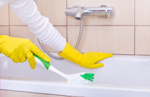 Professional cleaner preparing a kitchen in Knightsbridge